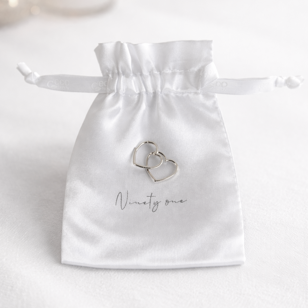 Signature Silver Heart Shaped Hoop Earrings